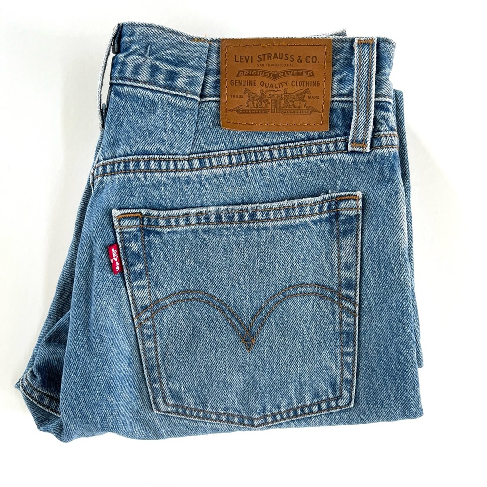 Women’s Levi’s premium denim jeans with butterfly buttons.